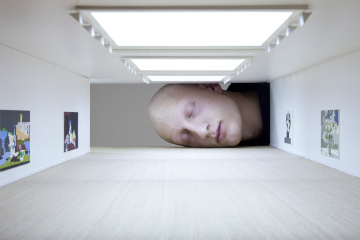 Tezi Gabunia Creates Surreal Big Heads Inside Art Galleries