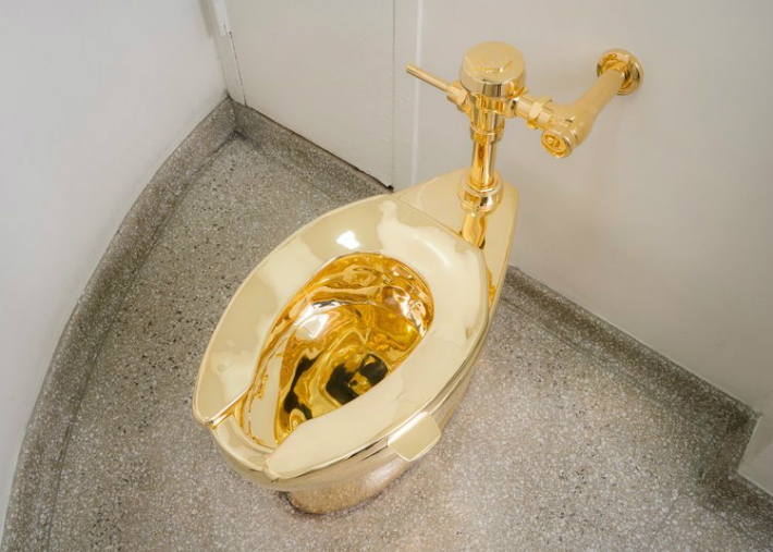 Exclusive Furniture: Maurizio Cattelan's 18K Gold Toilet